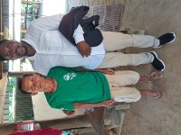 Chama Theodore Ketuauma with a supported farmer