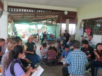 Students of Summer school are interviewing the farmer