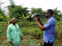 Ireti Emmanuel Adesida doing a video interview with a contact farmer at Akure South Local Government area of Ondo state, Nigeria on e-wallet adoption in Nigeria.