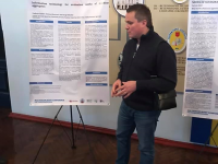 Poster presentations section. Dr. Vlad Zubko from Sumy National Agrarian University presenting his research.