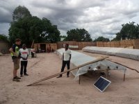 Jan Staš, using a low-cost solar dryer for food processing